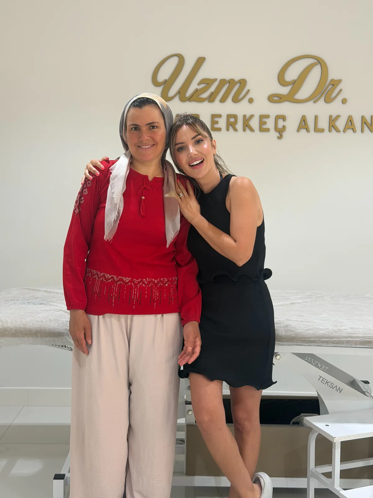 Dr. Serap Erkeç Alkan with a patient visiting her clinic