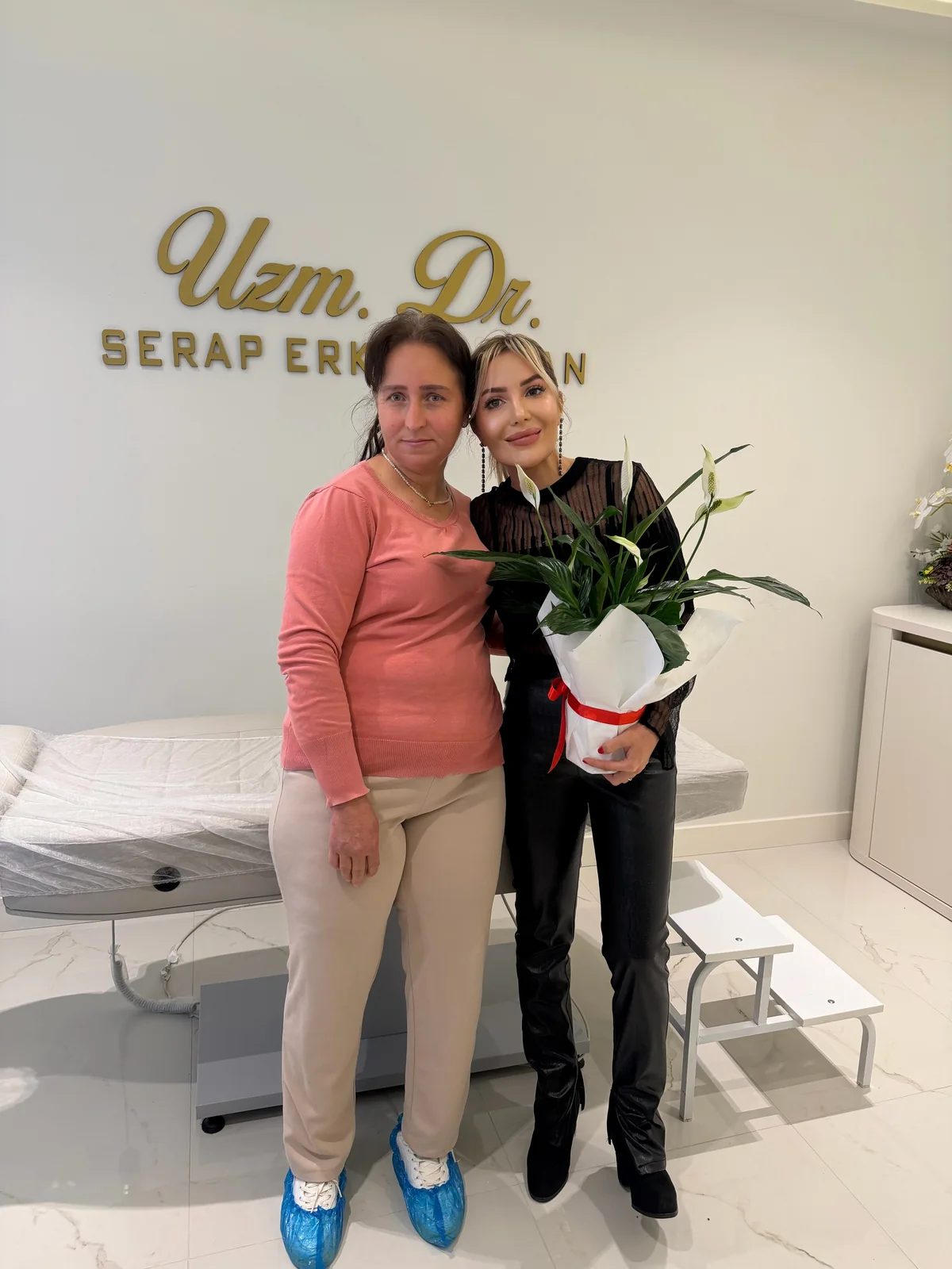 Dr. Serap Erkeç Alkan with a patient visiting her clinic