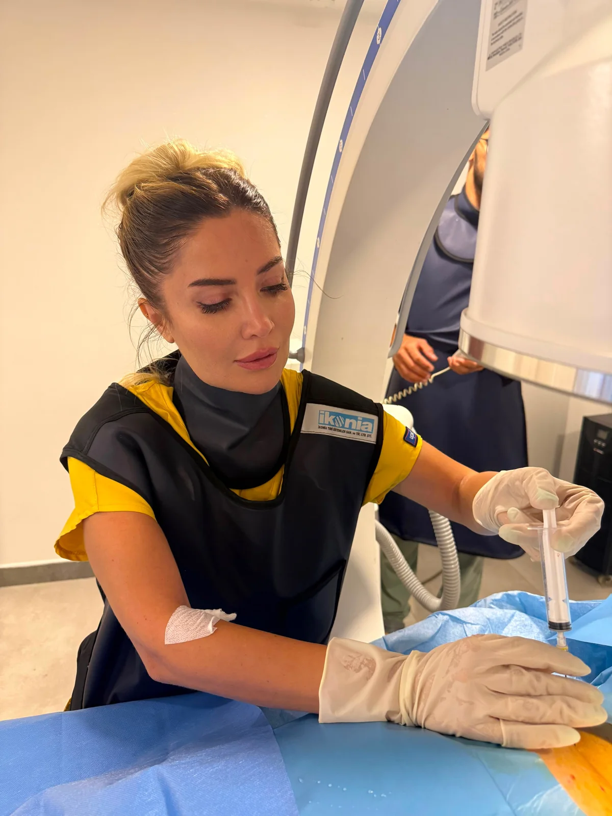 Dr. Serap Erkeç Alkan during a clinical procedure